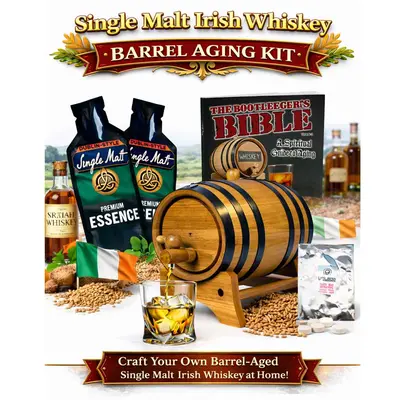 Irish single malt whiskey making kit with oak aging barrel, Dublin-style premium essence packets, Bootlegger’s Bible guide and glass of aged whiskey.