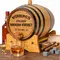 Mini oak bourbon aging barrel on wooden stand with whiskey glass, bottle, cigars, and whiskey stones for home aging and flavor infusion.
