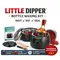 Little Dipper Bottle Waxing Kit with wax warmer, sealing wax pellets, stirring sticks, and a wax-sealed whiskey bottle.